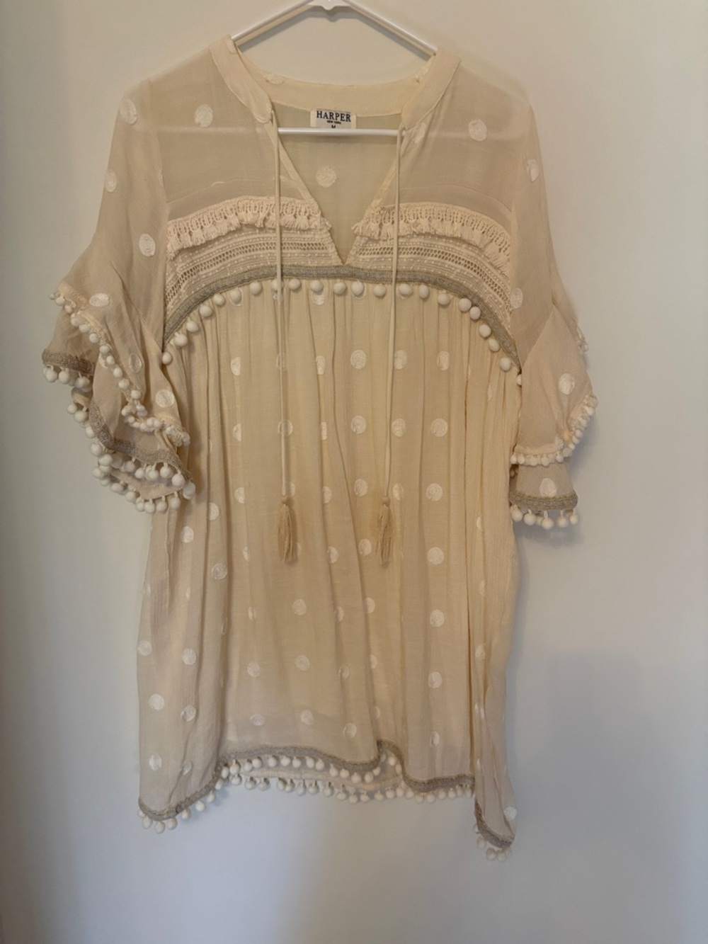 Harper size medium Elegant Cream Women's Top with Pom-Pom polka dot